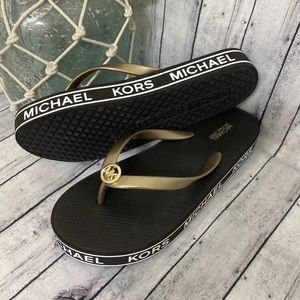 Michael Kors Authentic Rare chocolate brown FlipFlops with gold decal brand New